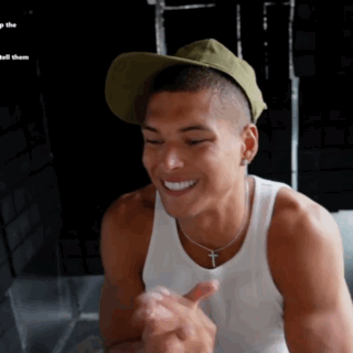 Man In Hat And White Tank Top Smiling GIF
