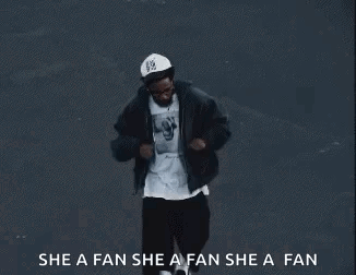 Man in Hat Dancing Saying She a Fan