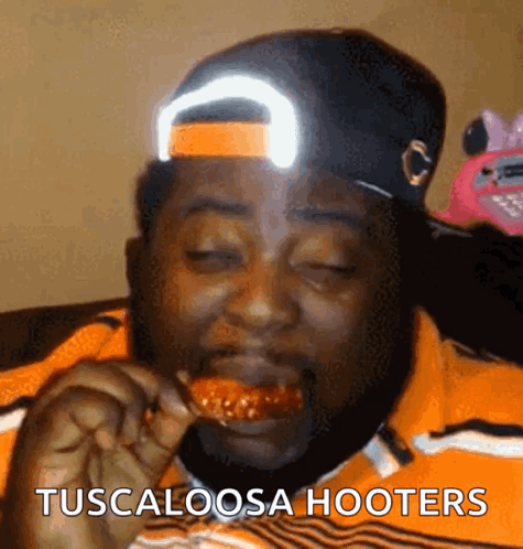 Man In Hat Eating Chicken Tuscaloosa Hooters GIF