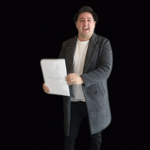 Man in Hat Holding Box Saying Done Deal