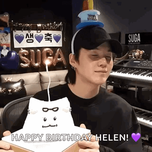 Man In Hat Holding Cat-Shaped Birthday Cake Saying Happy Birthday Helen GIF
