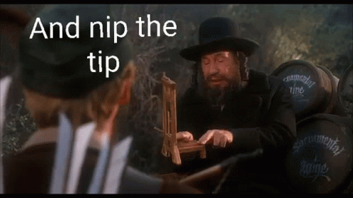 Man In Hat Holding Wooden Stick And Nip The Tip GIF