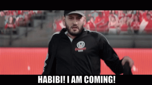 Man in Hat, Jacket Habibi I Am Coming