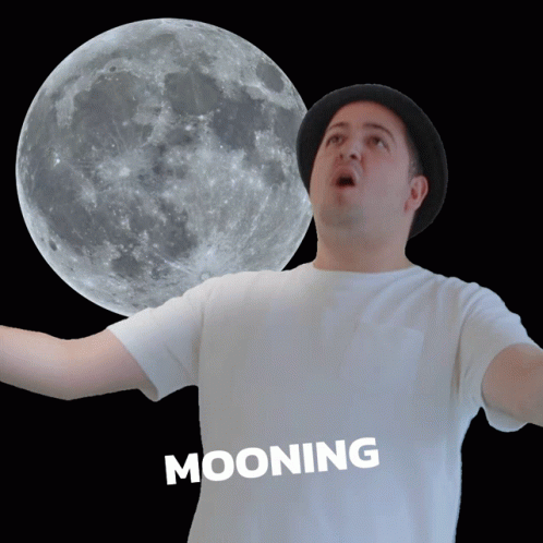 Man in Hat Mooning in Front of Full Moon