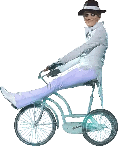 Man In Hat Riding Three-Wheeled Bicycle