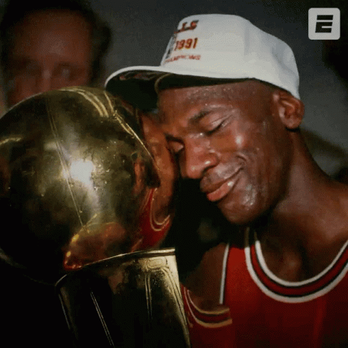 Man in Hat Saying 1991 Kissing Trophy