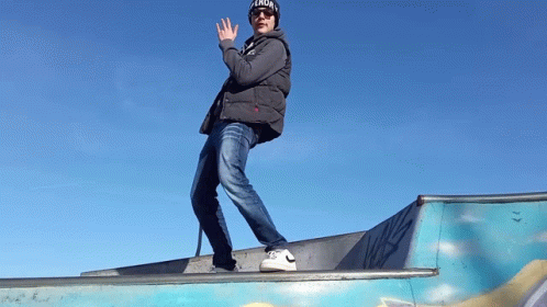 Man in Hat Saying Aaron Standing on Ramp