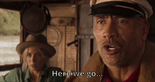 Man in Hat Saying Here We Go Woman in Hat