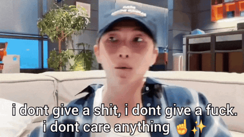 Man in Hat Saying I Don't Care