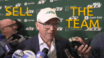 Man In Hat Saying Jets Talks To Reporters GIF