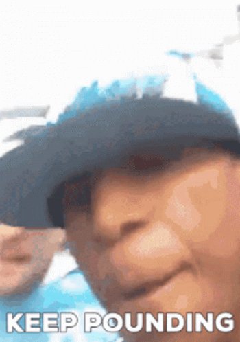 Man in Hat Saying Keep Pounding