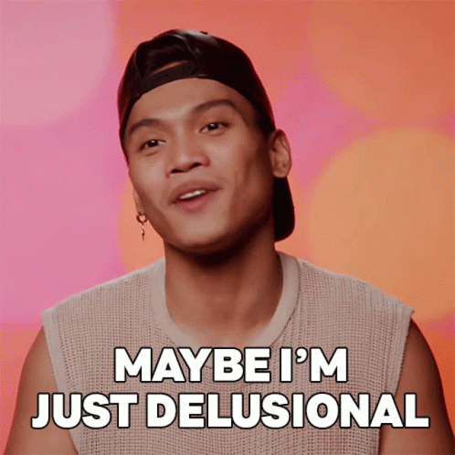 Man In Hat Saying Maybe I'm Delusional GIF