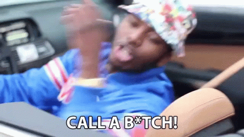 Man in Hat Sitting in Car Says Call a Bitch