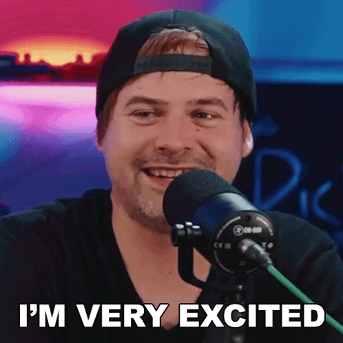 Man in Hat Smiling at Microphone Saying I'm Very Excited