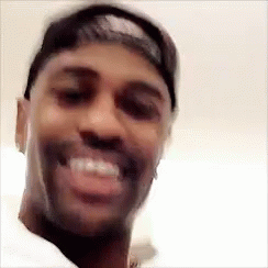 Man in Hat Smiling
