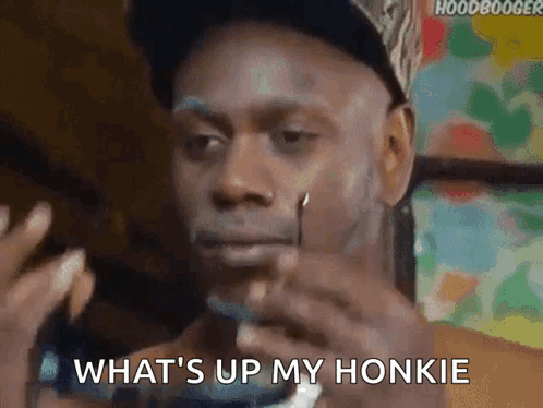 Man In Hat Smoking Cigarette Saying What's Up My Honkie GIF