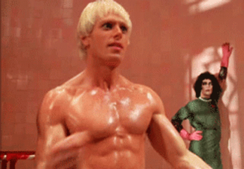 Man In Hat Standing In Doorway Says I Am Your Singing Telegram GIF