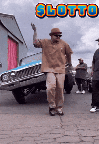 Man In Hat Standing In Front Of Lotto Car GIF