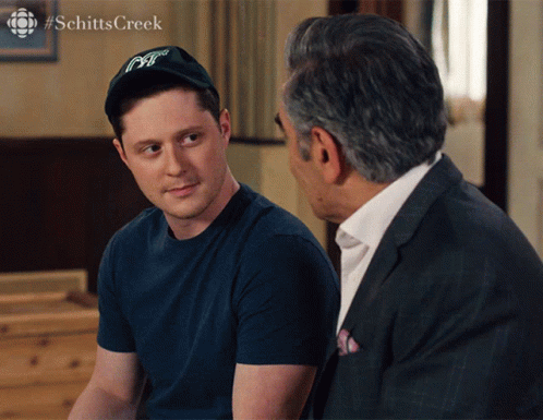 Man in Hat Talking to Man in Suit #Schittscreek
