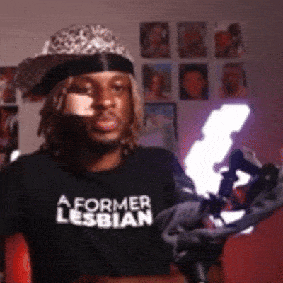 Man in Hat with A Former Lesbian Shirt