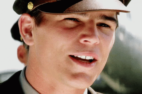 Man In Hat With Gold Coin GIF