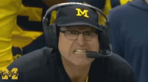 Man In Hat With Letter M And Headphones GIF