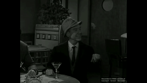 Man in Hat with Martini Glass Saying For a Big One