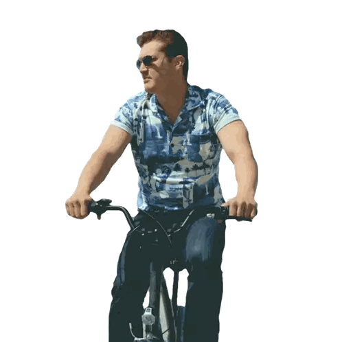 Man in Hawaii Shirt Riding Bike