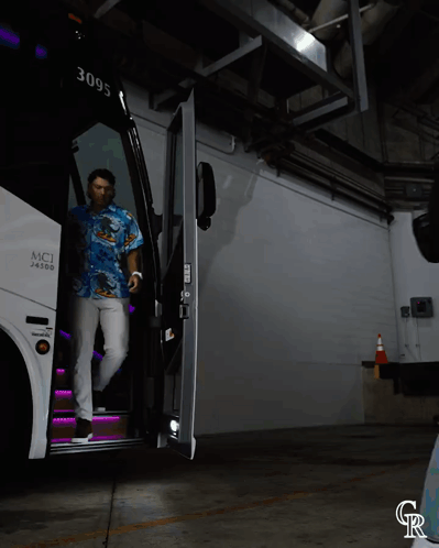 Man in Hawaiian Shirt Getting Off MCI 24000 Bus