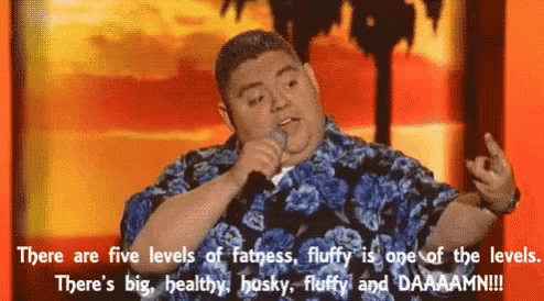 Man in Hawaiian Shirt Giving Middle Finger Holding Microphone