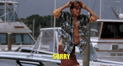 Man in Hawaiian Shirt Saying Sorry Boats