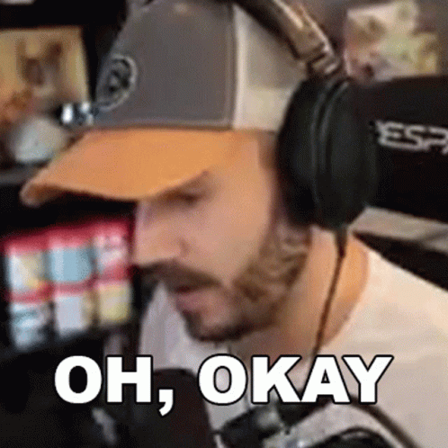 Man In Headphones And Baseball Cap Saying Oh Okay GIF