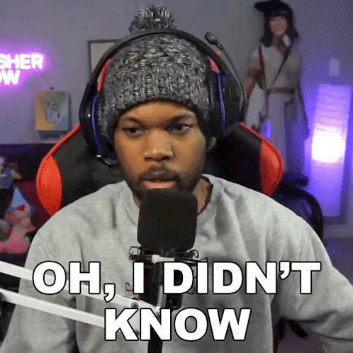 Man In Headphones And Beanie Saying Oh I Didn't Know GIF