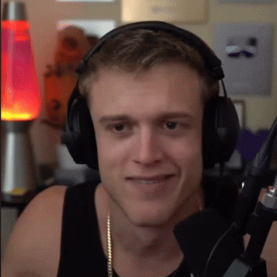 Man in Headphones and Black Tank Top Smiling
