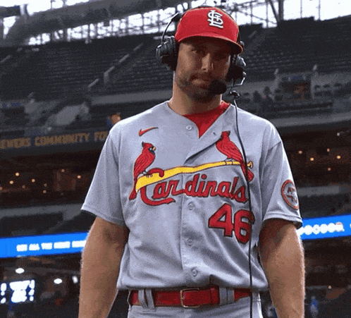 Man in Headphones and Cardinals Uniform