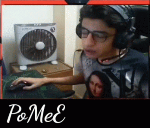 Man In Headphones And Glasses Playing Video Game With Mouse GIF