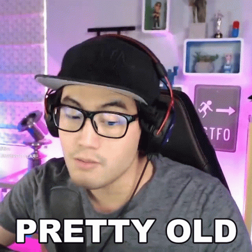 Man in Headphones and Glasses Saying Pretty Old