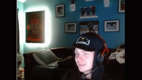 Man in Headphones and Hat