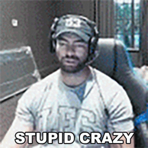 Man in Headphones and Hat Saying Stupid Crazy