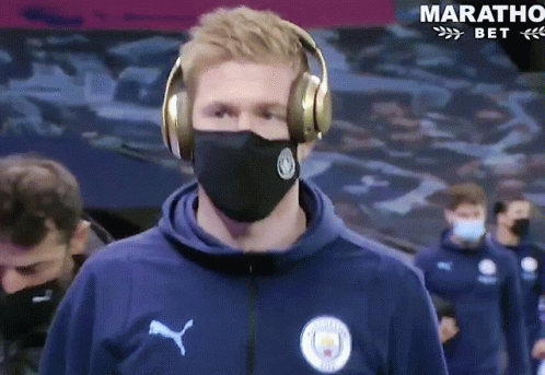 Man in Headphones and Mask Marathon