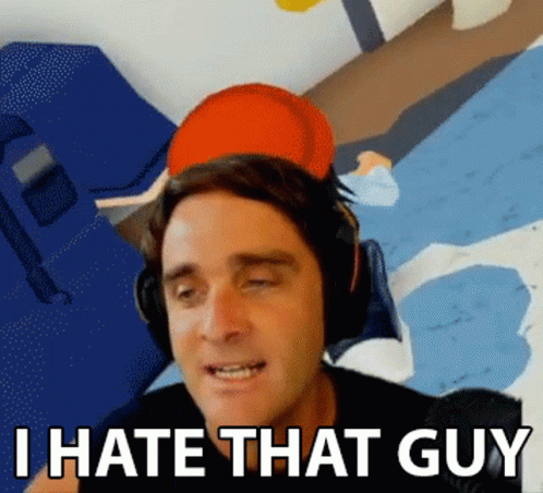 Man in Headphones and Red Hat Says I Hate That Guy