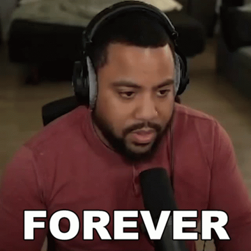 Man in Headphones and Red Shirt Saying Forever