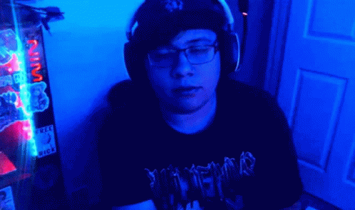 Man in Headphones and Slayer T-Shirt