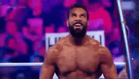 Man In Headphones And Tank Top Says Watch GIF