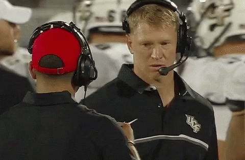 Man in Headphones and UCF Shirt