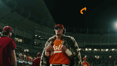 Man in Headphones and Vols Shirt With Vols Logo