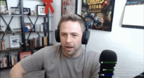 Man in Headphones at Microphone World of Warcraft 15 Year