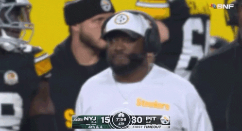 Man in Headphones Before Steelers vs Jets Scoreboard
