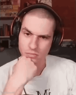Man in Headphones Making a Face