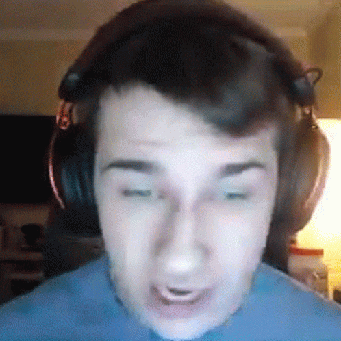 Man in Headphones Making Funny Face